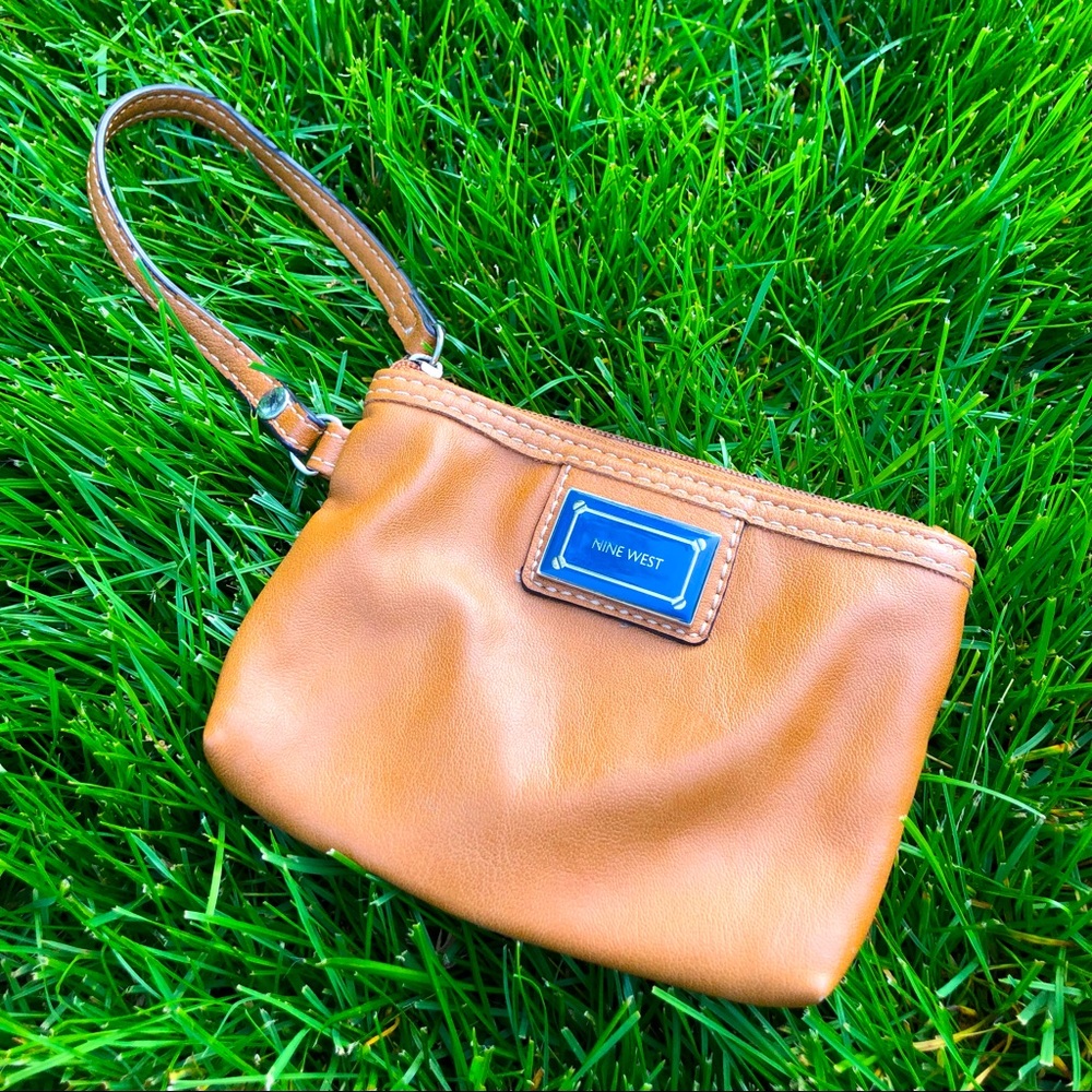 Tan Leather Nine West wristlet bag.